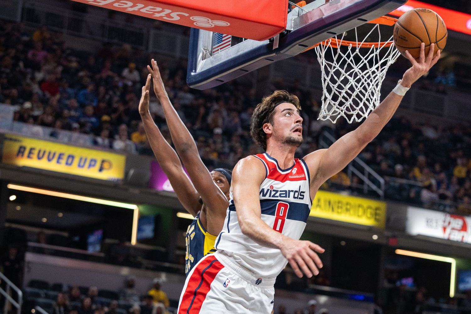 Washington Wizards forward Deni Avdija (8) shoots the ball while Indiana Pacers center Myles Turner (33) defends in the second quarter at Gainbridge Fieldhouse. 